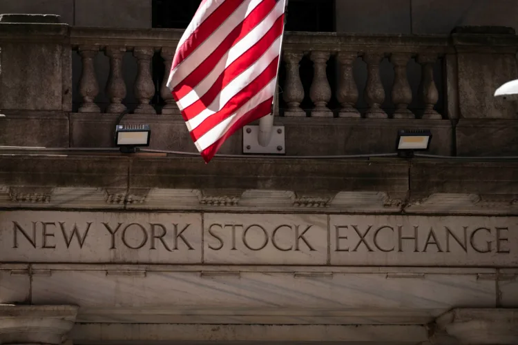 US stocks edge down from their record after oil climbs